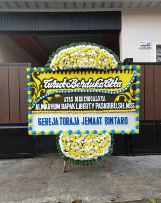 Papan Bunga Duka di Bakunase